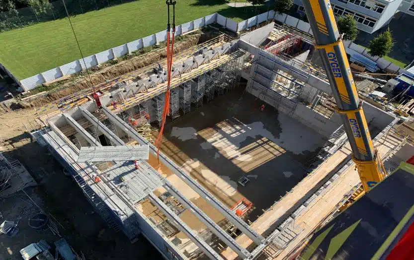 Démolition et reconstruction d'un collège avec salle de gym double